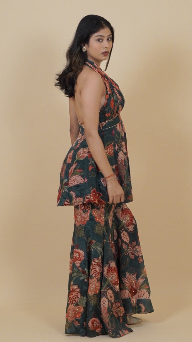 Woman wearing a floral dress against a beige background